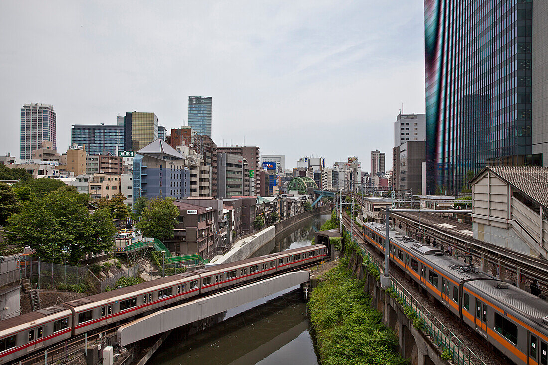 Trains crossing at Ochanomizu Station and canal, Bunkyo-ku, Tokyo, Japan