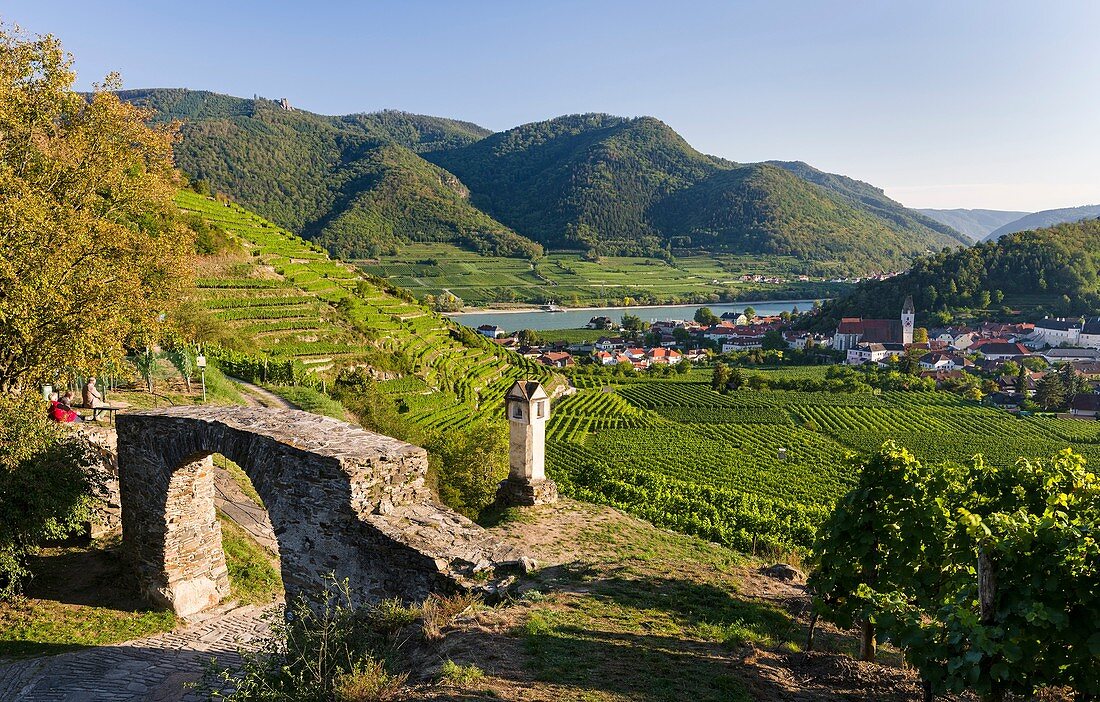Old town gate Rote Tor in the village Spitz, which is nested in the vineyards of the Wachau. The Wachau is a famous vineyard and listed as Wachau Cultural Landscape as UNESCO World Heritage. Europe, Central Europe, Austria, Lower Austria.