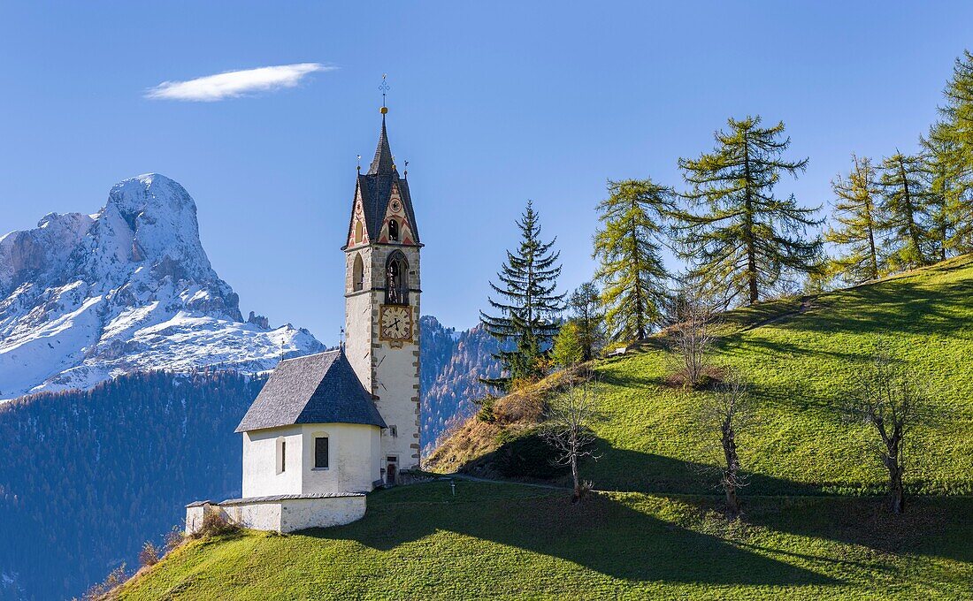 Chapel Barbarakapelle - Chiesa di santa Barbara in the village of Wengen - La Valle, in the Gader Valley - Alta Badia in the Dolomites of South Tyrol - Alto Adige, Mount Peitlerkofel - Sass de Putia in the background. The Dolomites are listed as UNESCO Wo