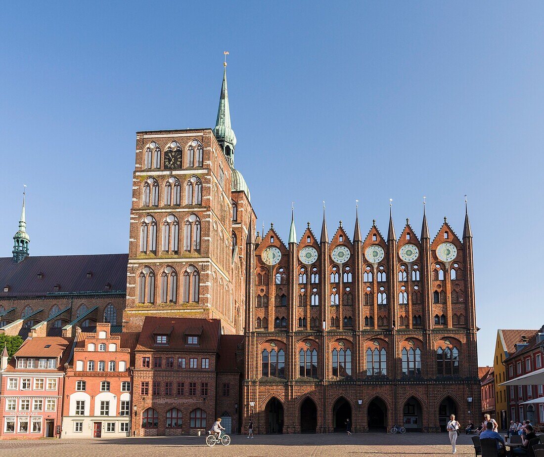 The Alte Markt (old market) with the iconic town hall and the church St. Nikolei (Saint Nicholas). The Hanseatic City Stralsund. The old town is listed as UNESCO World Heritage. Europe, Germany, West-Pomerania, June.