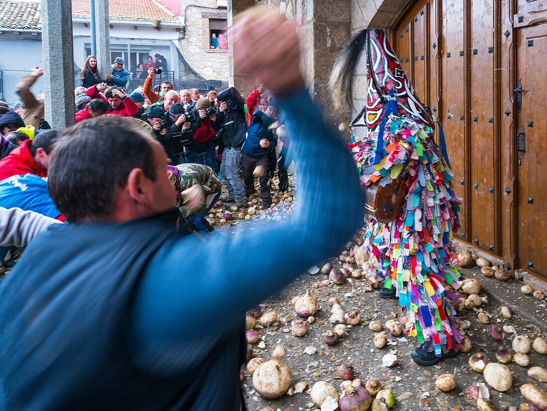 Villagers throwing turnips at Jarramplas, Carnival, Piornal, Jerte Valley, Cáceres province, Extremadura, Spain, Europe.