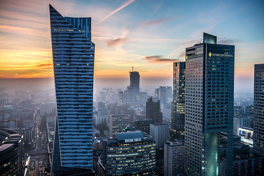 Sunset over Warsaw, Poland. Aerial view with Zlota 44 skyscraper, Warsaw Towers and InterContinental Hotel.