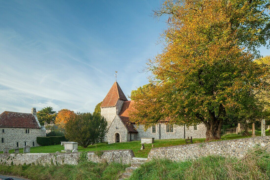 All Saints church in Westdean, East Sussex, England on an autumn afternoon. South Downs National Park.