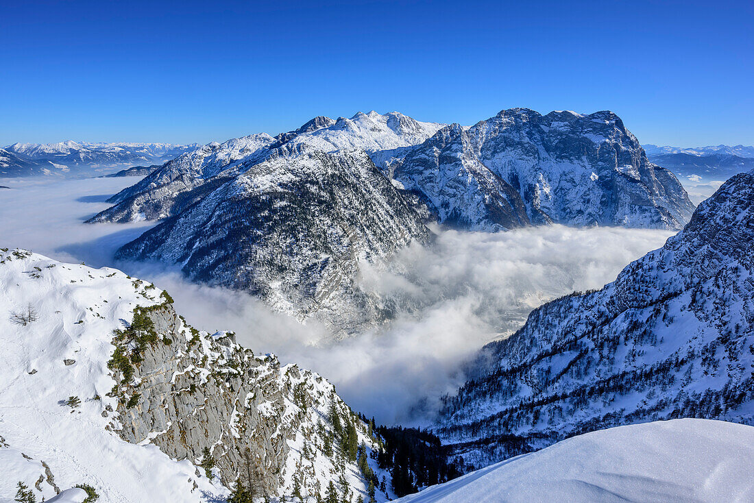 View towards Tennengebirge range and sea of fog, from Hoellriedlschneid, Berchtesgaden Alps, Salzburg, Austria