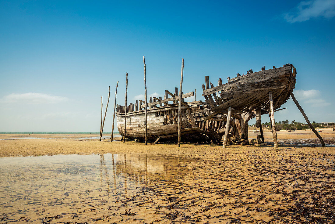 'Wrecked fishing boat on Vilanculos beach, Bazaruto Archipelago; Mozambique'