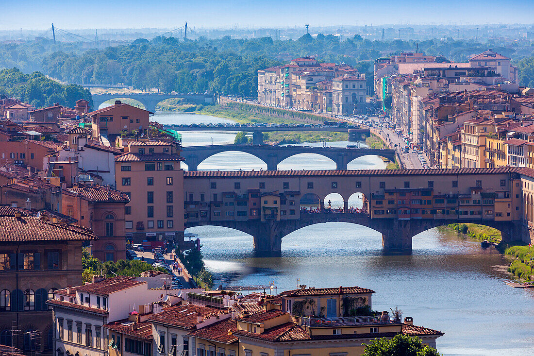 Florence, Florence Province, Tuscany, Italy. View from Piazzale Michelangelo to bridges across Arno river. Ponte Vecchio in foreground.