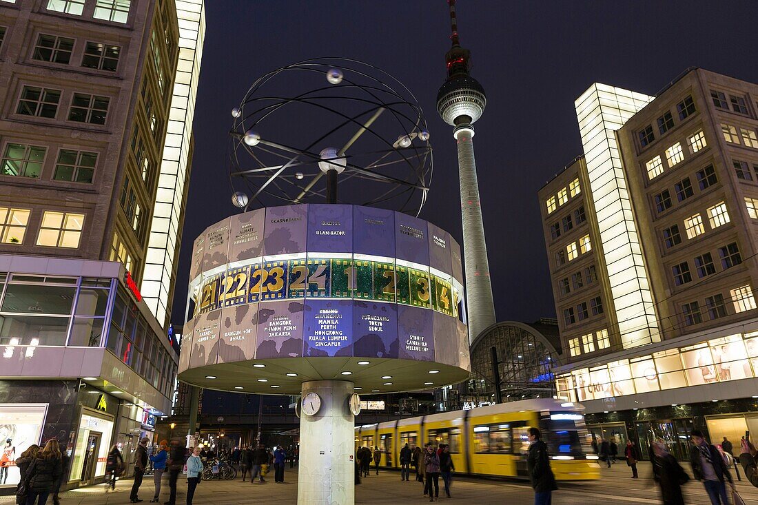 World clock and television tower at night, Alexanderplatz, Berlin, Germany.