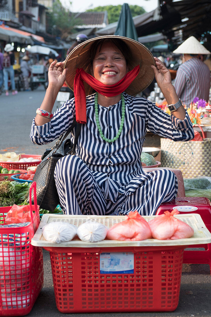 A street market seller in Hoi An, Vietnam, Indochina, Southeast Asia, Asia
