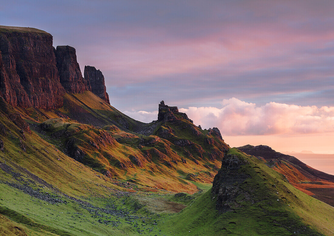 Early morning dawn light hits the Quiraing in the Trotternish peninsula on the Isle of Skye, Inner Hebrides, Scotland, United Kingdom, Europe