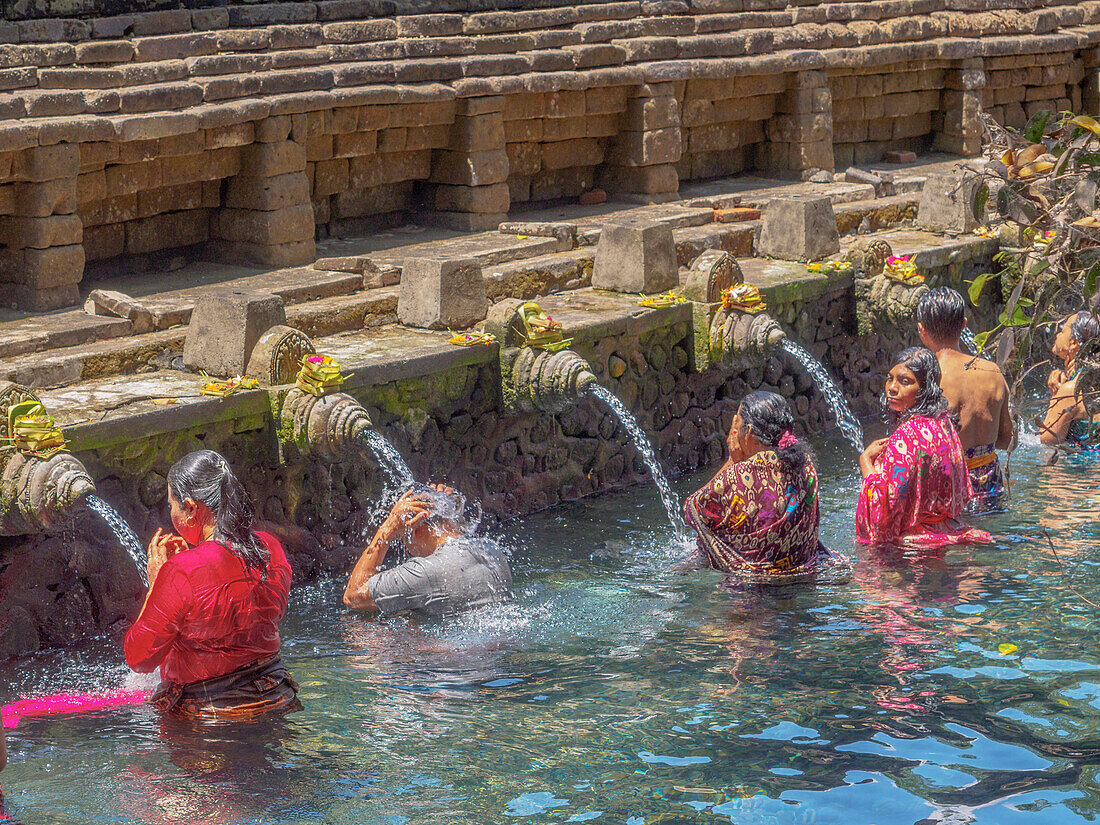 Bathing in the holy waters of Pura Tirta Empul, Bali, Indonesia, Southeast Asia, Asia