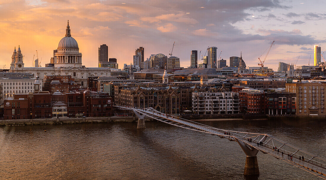 The view of the City of London from Tate Modern with the Millennium Bridge over the River Thames, and St. Paul's Cathedral, London, England, United Kingdom, Europe