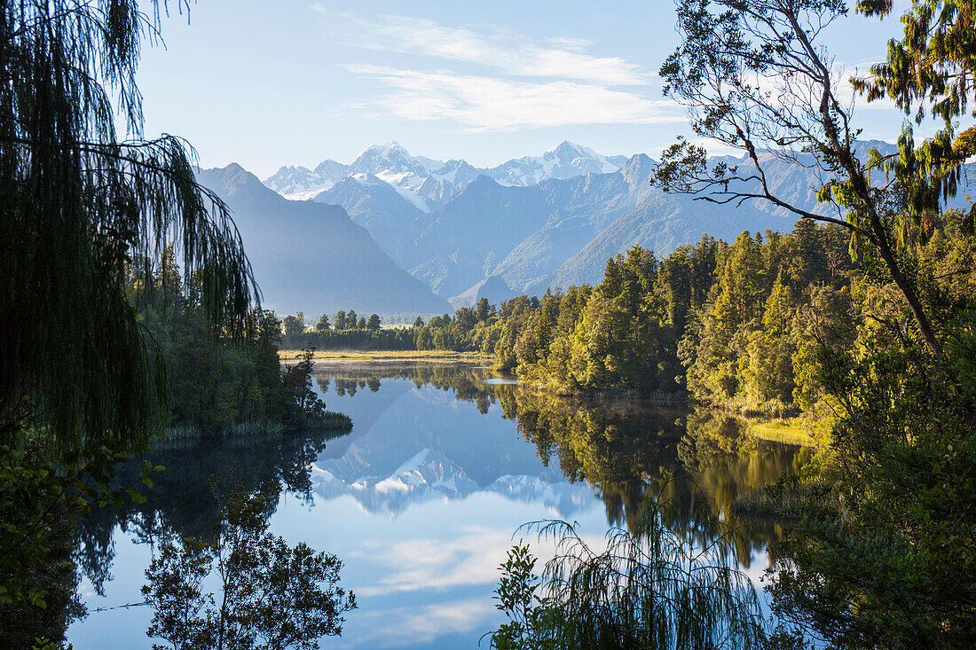 Mount Tasman and Aoraki (Mount Cook) reflected in Lake Matheson, Westland Tai Poutini National Park, UNESCO World Heritage Site, West Coast, South Island, New Zealand, Pacific