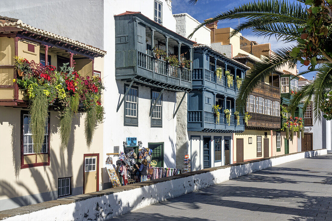 Row of houses along Avenida Maritima, wooden balconies with flowers, Santa Cruz, La Palma, Canary Islands, Spain