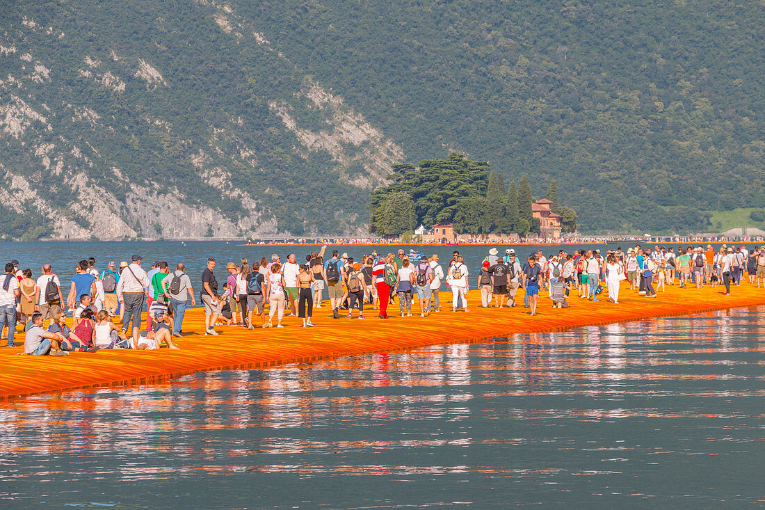 Walking on The Floating Piers in Iseo Lake , Italy, Europe