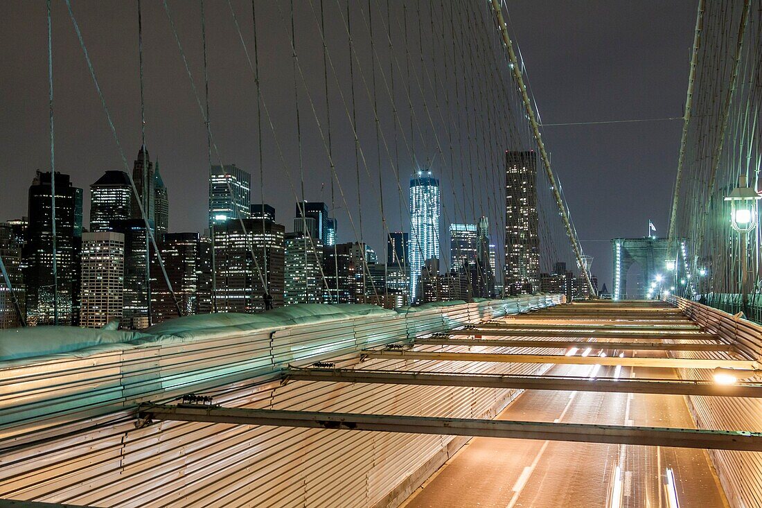 USA, New York City, Downtown Financial district of Manhattan and the Brooklyn Bridge