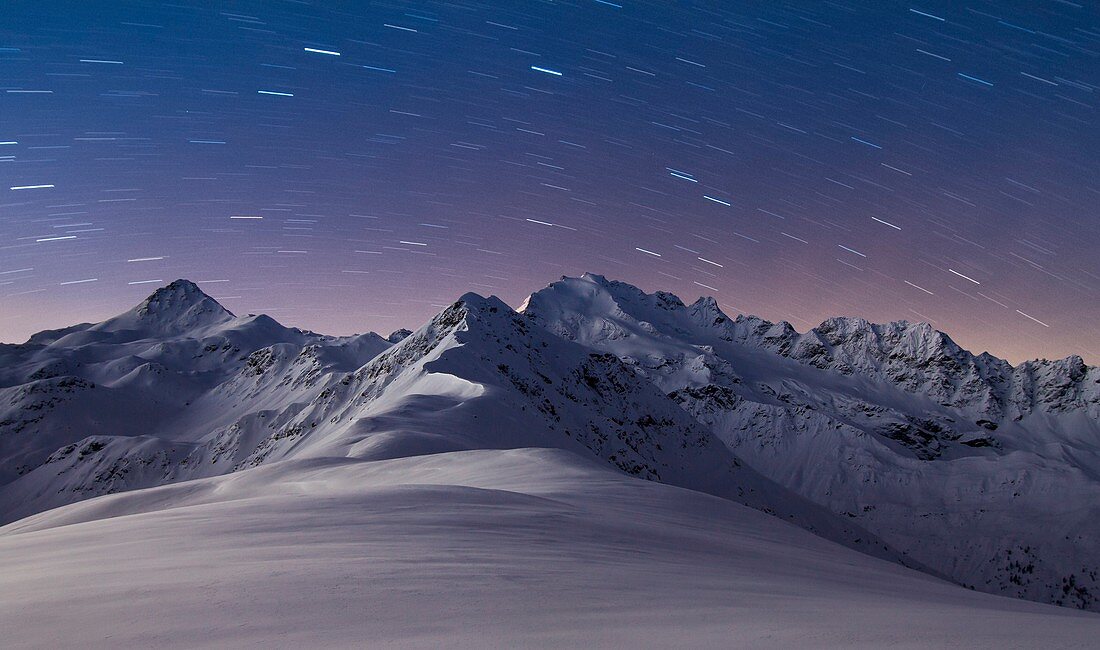 Europe, Italy, Lombardy, Sondrio, Cima Piazzi mountains in a stars winter night, Valtellina, Italian Alps