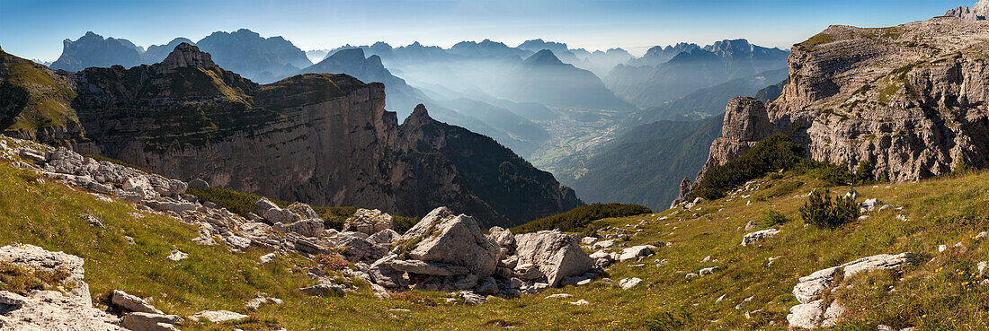 Wide view on the First and Second Pala di San Lucano, Dolomites, On the background on a succession of summits from Civetta, Moiazza until Schiara and Monti del Sole, Agordino, Belluno, Veneto, Italy, Europe