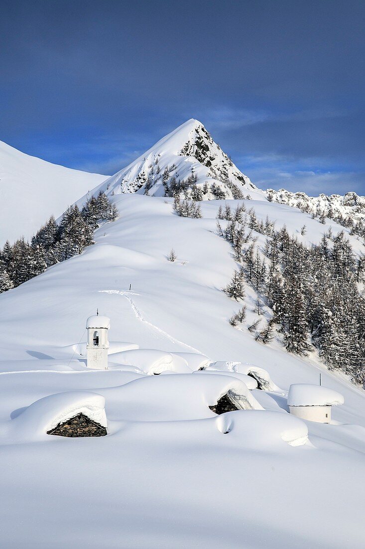 Huts in Alpe Scima covered in snow, Alpe Scima, Valchiavenna, Valtellina Lombardy, Italy Europe