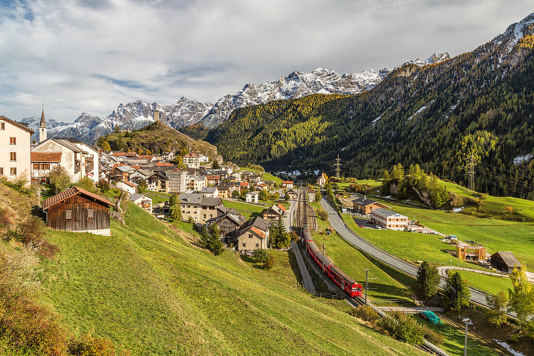 View of Ardez village surrounded by woods and snowy peaks Lower Engadine Canton of Graub++nden Switzerland Europe