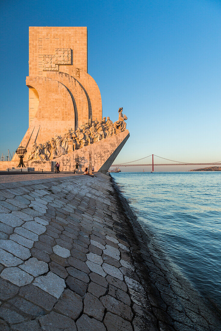 Sunset on the Tower of Bel+®m on the bank of the Tagus River Padr+úo dos Descobrimentos Lisbon Portugal Europe