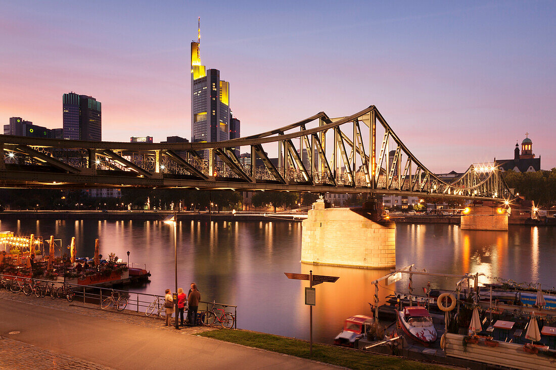 Eiserner Steg Bridge and financial district at sunset, Frankfurt, Hesse, Germany, Europe