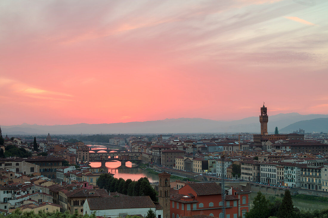 Arno River with Ponte Vecchio and Palazzo Vecchio at sunset seen from Piazzale Michelangelo, Florence, Tuscany, Italy, Europe