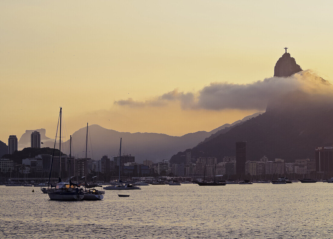 Sunset over Botafogo Bay and Corcovado Mountain viewed from Urca, Rio de Janeiro, Brazil, South America