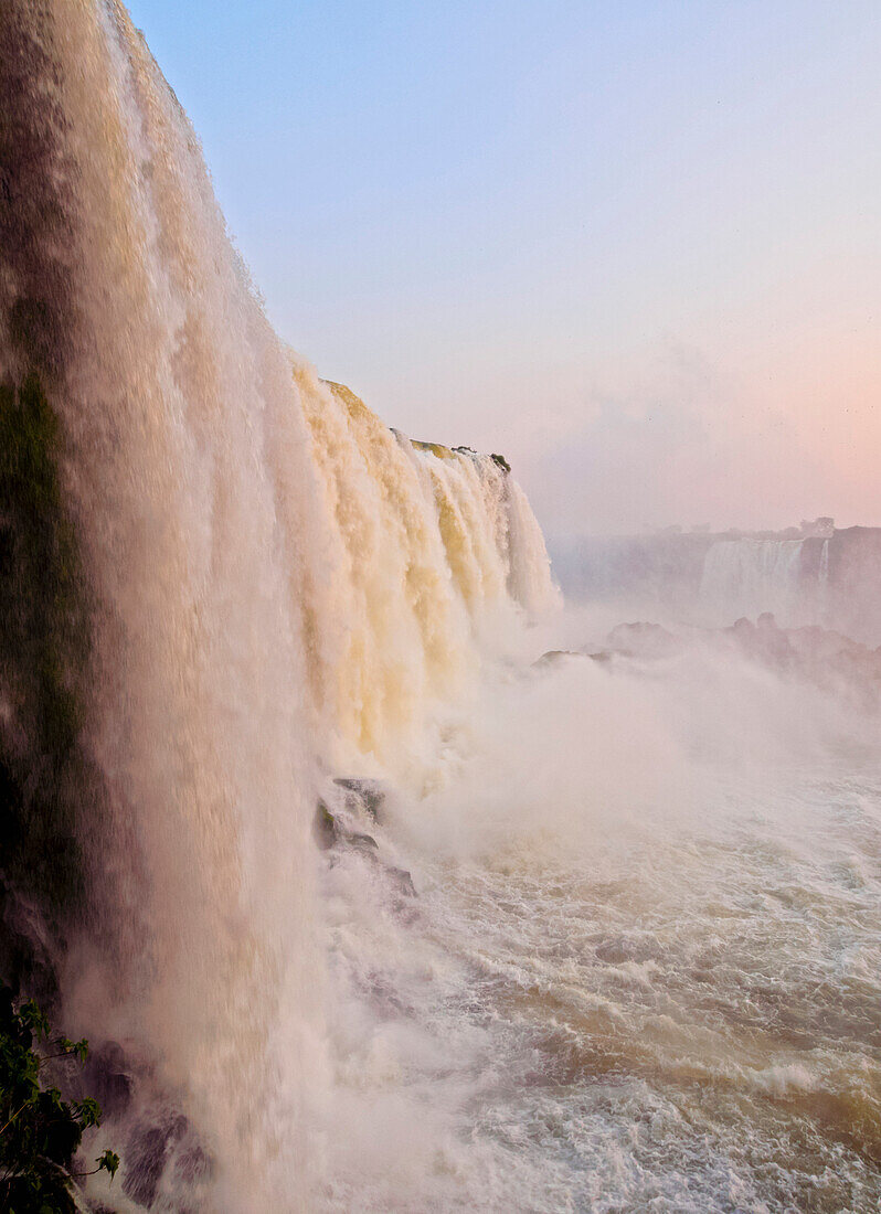 View of the Iguazu Falls at sunset, UNESCO World Heritage Site, Foz do Iguacu, State of Parana, Brazil, South America