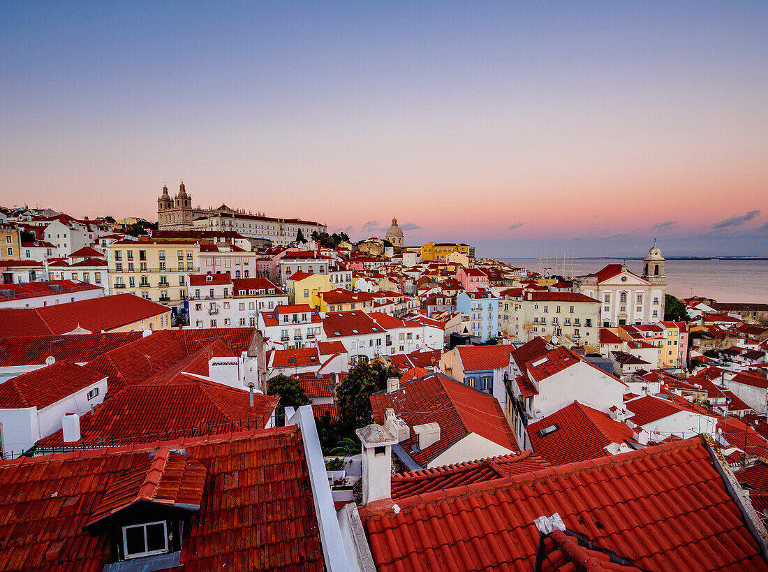 Miradouro das Portas do Sol, view over Alfama Neighbourhood at sunset, Lisbon, Portugal, Europe