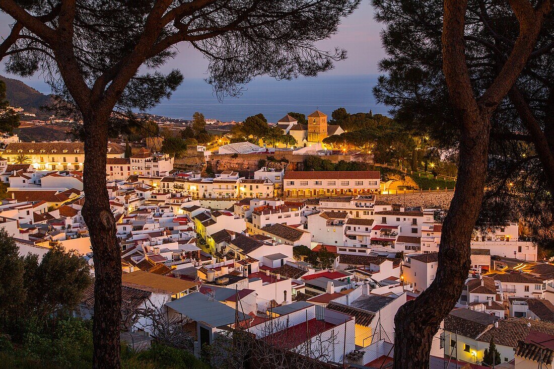 White village of Mijas at dusk. Malaga province Costa del Sol. Andalusia Southern Spain, Europe.