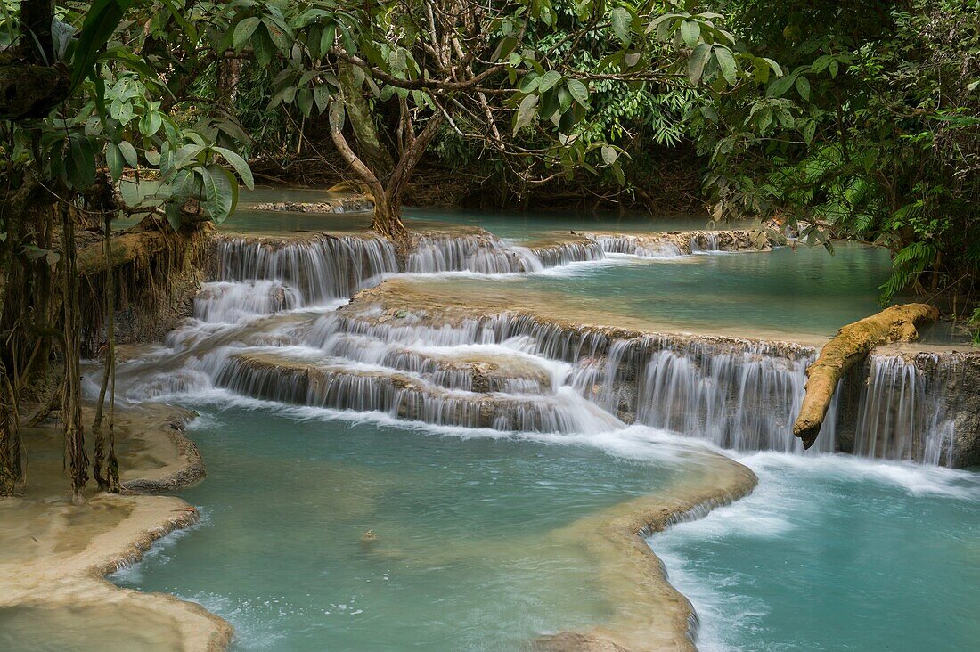 Cascades and turquoise blue pools of the Kuang Si Falls near Luang Prabang in Laos.