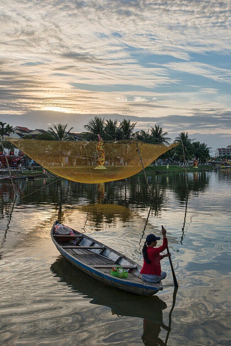Traditional fishing net on the Thu Bon River, Hoi An, Vietnam.