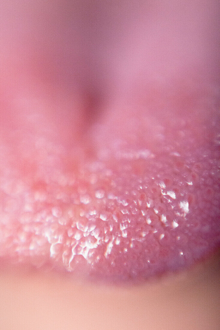 Extreme close-up of woman's tongue