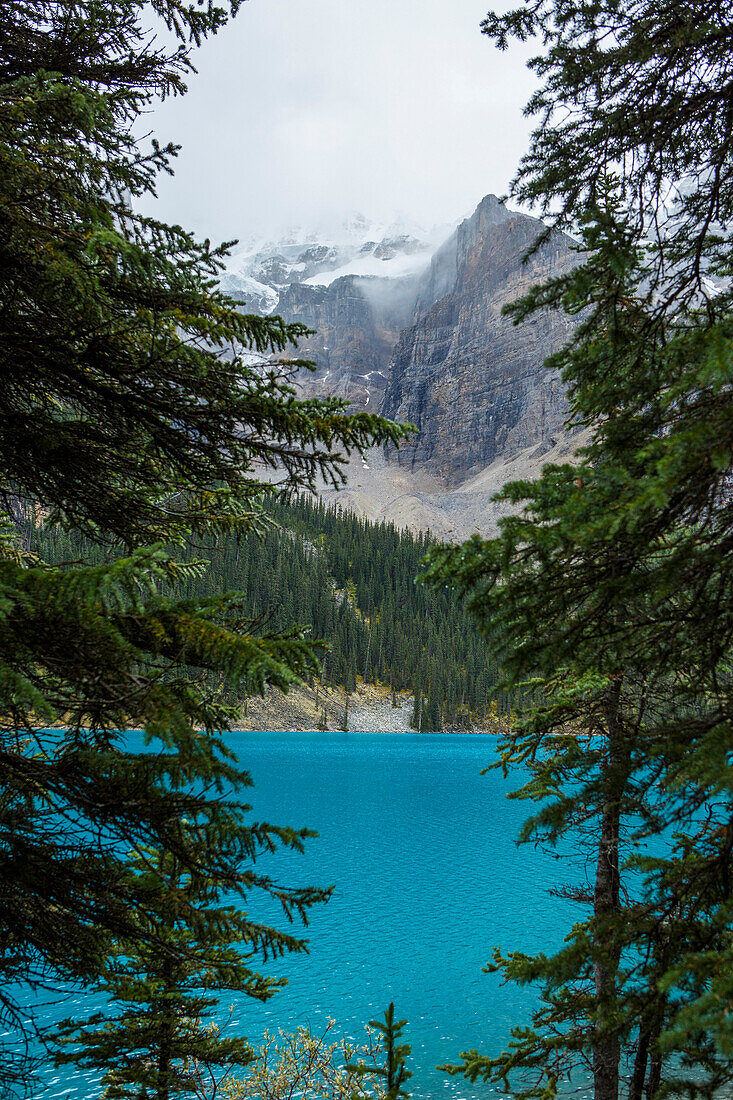 Lake at foggy mountain