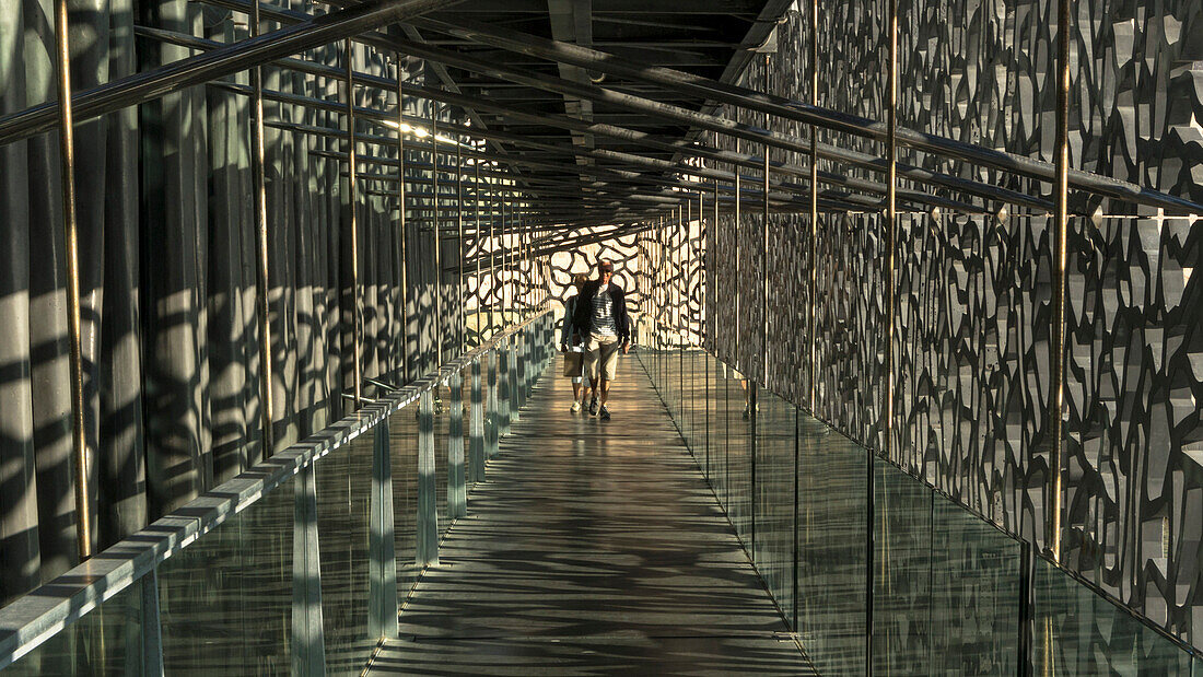 France, South-Eastern France, French Riviera, Marseille, two people in a passageway of the MuCEM (Museum of European and Mediterranean Civilisations) Mandatory credit: Architect Rudy Riciotti