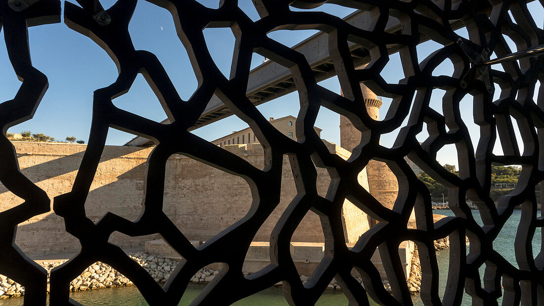 France, South-Eastern France, French Riviera, Marseille, MuCEM (Museum of European and Mediterranean Civilisations)  and Fort St Jean behind the mashrabiya. Mandatory credit: Architect Rudy Riciotti