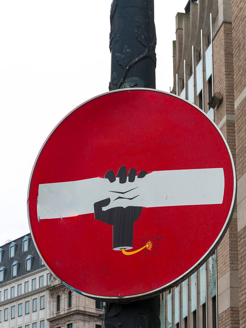Belgium, Brussels, no entry sign distorted by an artist into a dynamite stick