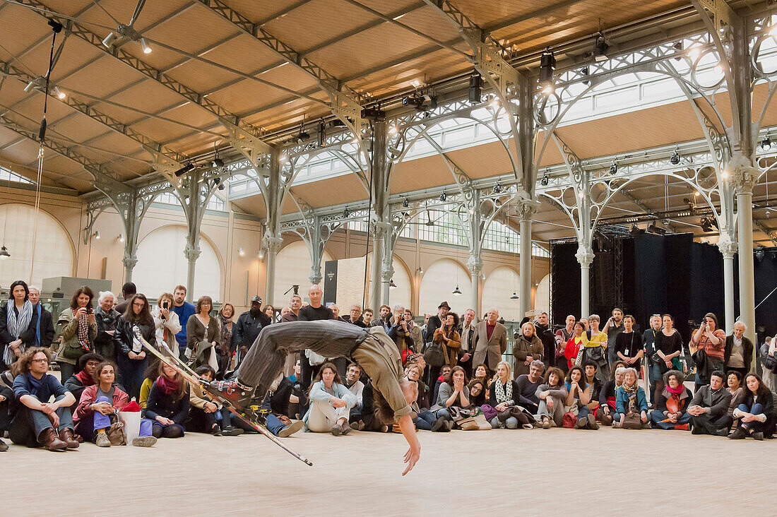 Europe, France, Paris (75), 3rd arrondissement, Le Marais, the 'Carreau du Temple'. April 25th, 2014. Opening day. Funny Acrobatic show by the Kadavresky corporation. It is a former clothes market that was redeployed in a cultural and sport center in 2015