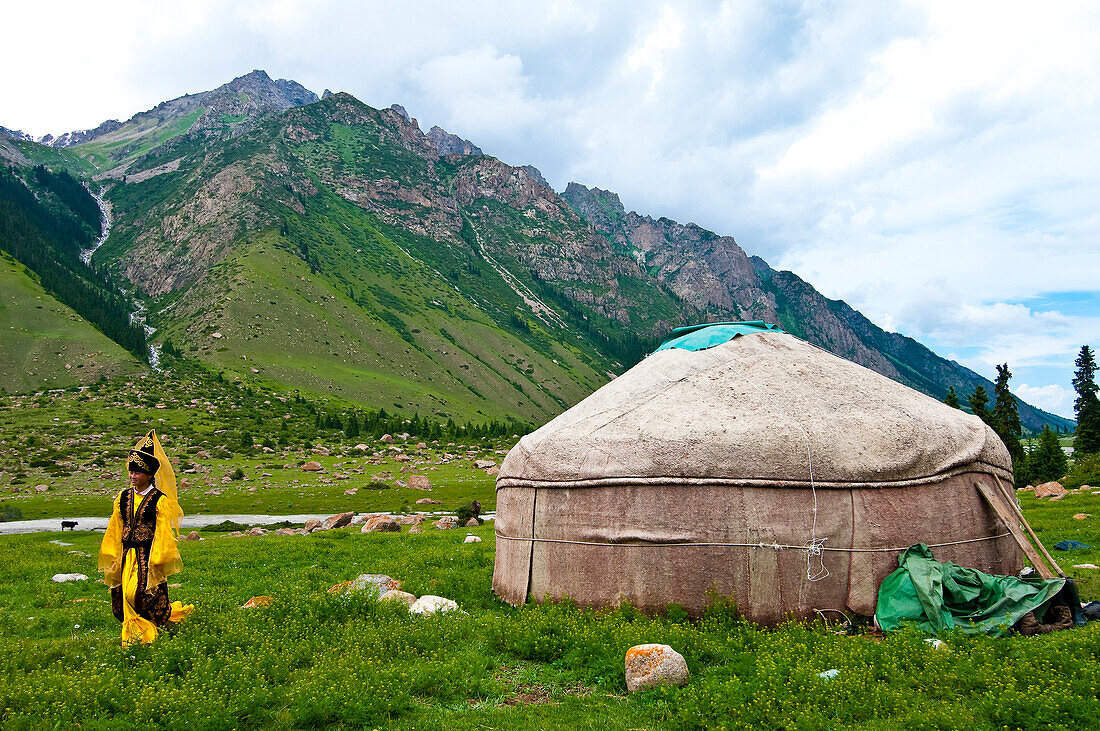 Kyrgyzstan, Issyk Kul Province (Ysyk-Kol), Juuku valley, Goulzana Talantbekoze wearing the traditional Kiz Kumai clothes, a horse game