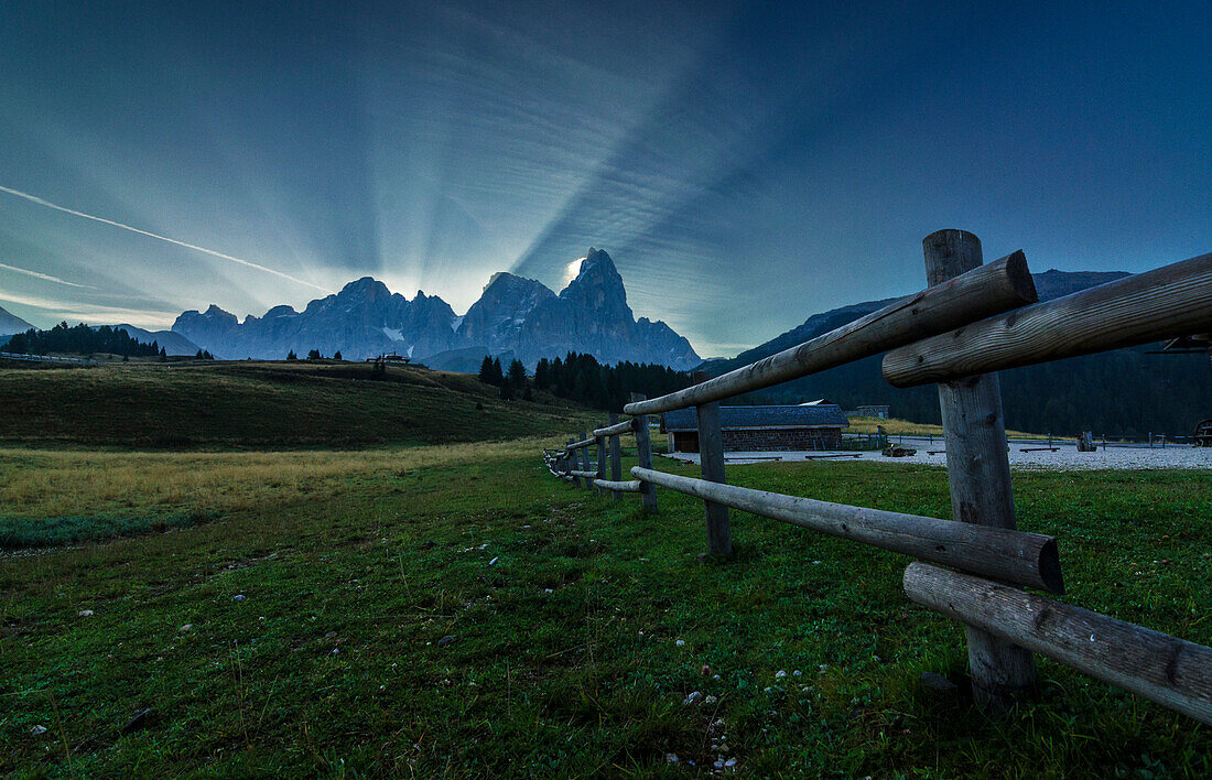Rolle Pass, Pale di San Martino, Dolomites, Trento, South Tyrol, Italy, Crepuscolar rays behind Pale di San Martino