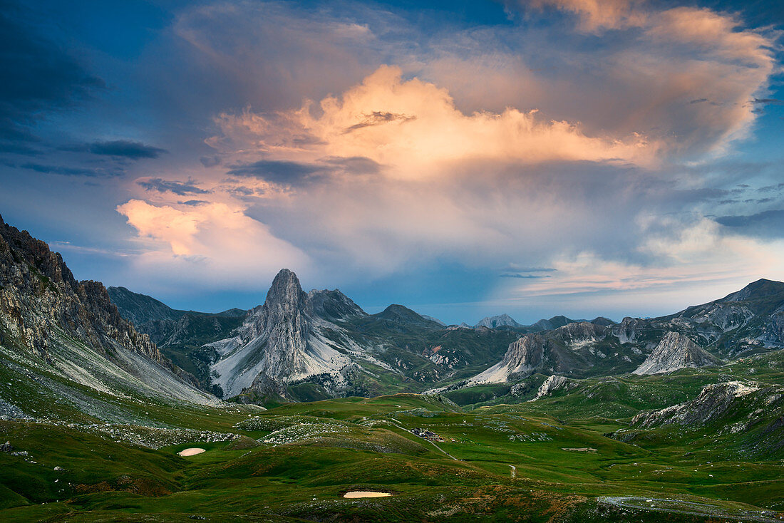 Italy, Piedmont, Cuneo District, Maira Valley - Gardetta plateu and Rocca La Meja at sunset