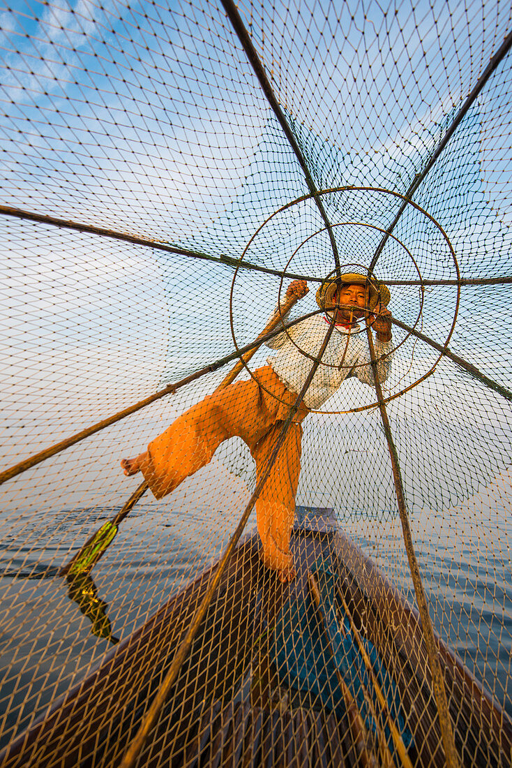 Inle lake, Nyaungshwe, Shan state, Myanmar, Fisherman looking through the fishing net