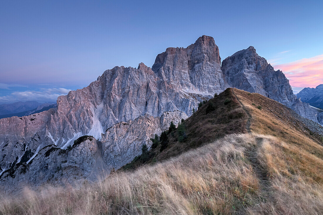 Europe, Italy, Veneto, Cadore, Autumnal dusk on top of the Col de la Puina towards mount Pelmo, Dolomites