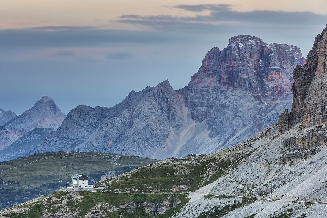 Europe, Italy, Veneto, Belluno, Auronzo hut at the foots of Tre Cime di Lavaredo, on the background Croda Rossa, Dolomites