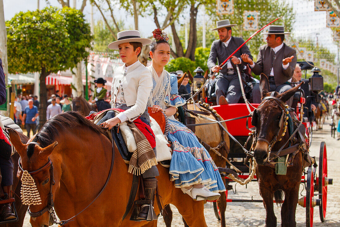 horseriding couple on horseback, Feria de Abril, Seville Fair, spring festival, Sevilla, Seville, Andalucia, Spain, Europe