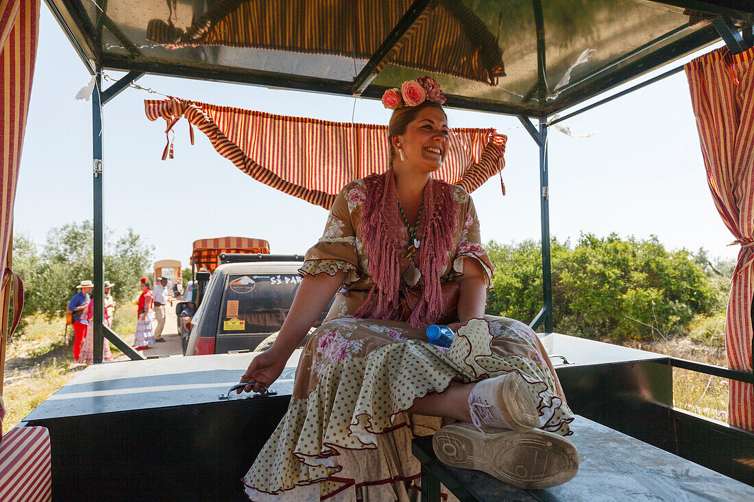 woman in a trailer, El Rocio, pilgrimage, Pentecost festivity, Huelva province, Sevilla province, Andalucia, Spain, Europe