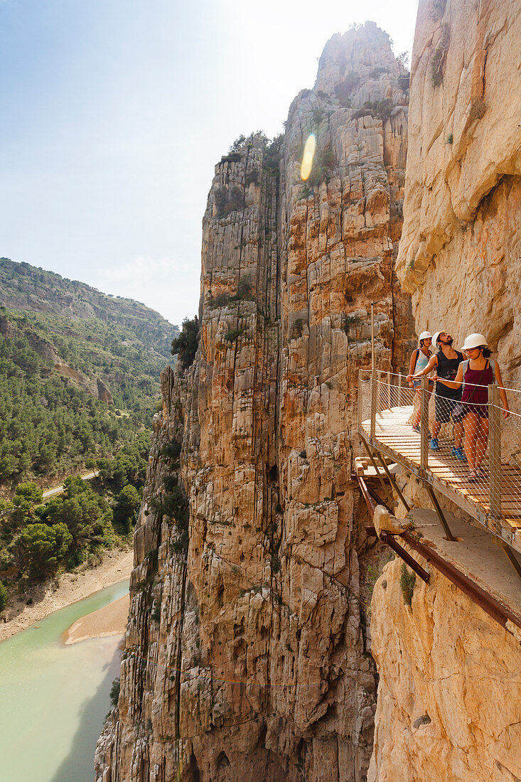 hikers at Caminito del Rey, via ferrata hiking trail, gorge, Rio Guadalhorce, river, Desfiladero de los Gaitanes, near Ardales, Malaga province, Andalucia, Spain, Europe