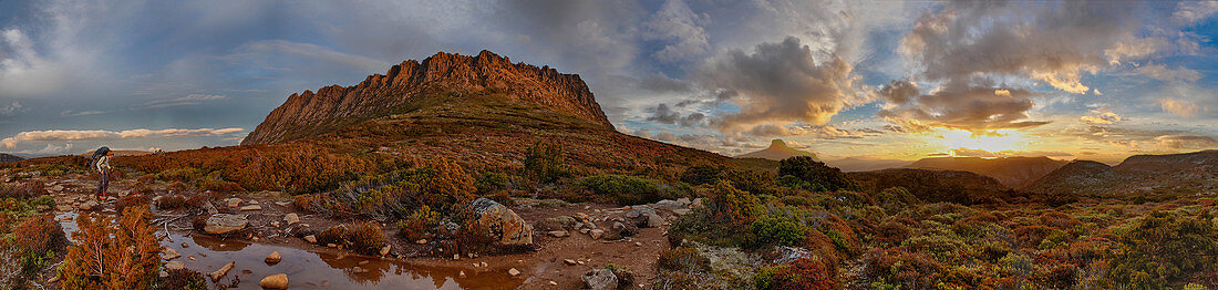 Backpacker Passing Through Cradle Mountain In Saint Clair National Park