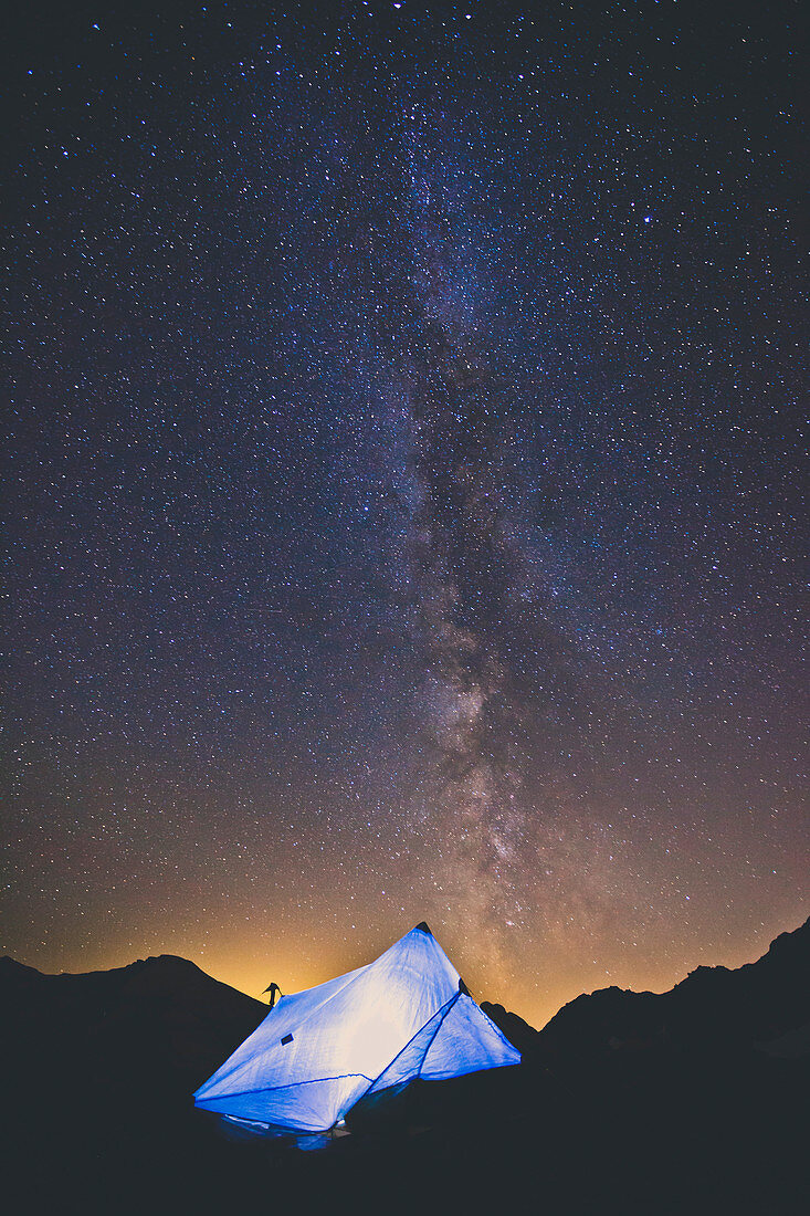 Tarp Tent Below Night Sky And Milky Way In North Cascades National Park