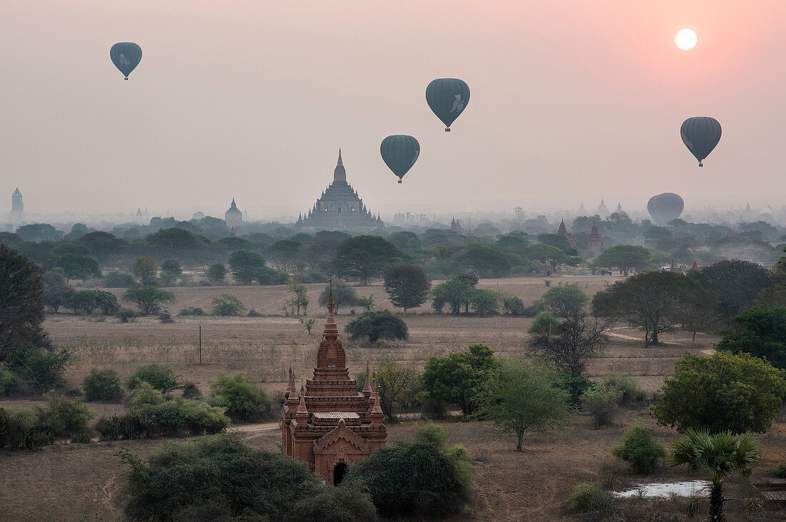 Hot Air Balloons Flying Over The Temples Of Bagan In Myanmar